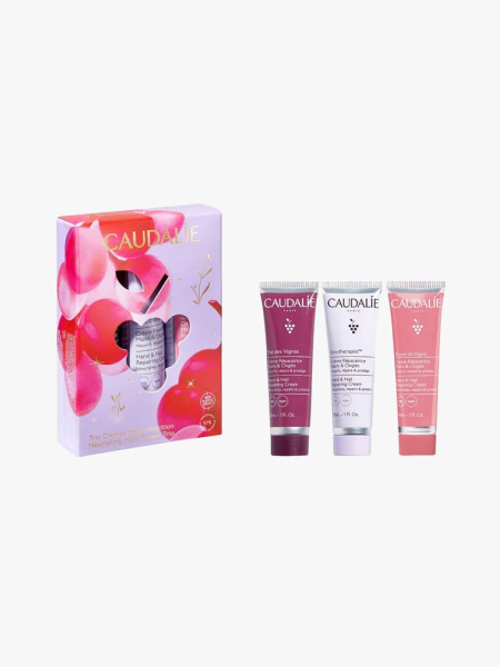 Caudalie Hydrating & Nourishing Hand Cream Trio in branded tube components on a light gray background