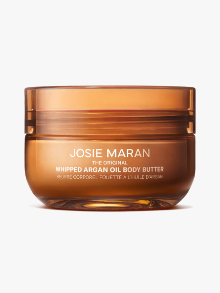 Josie Maran Whipped Argan Oil Body Butter in orange jar with lid